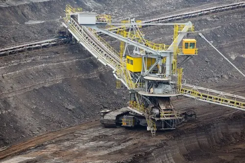 Aerial view of a mining operation with bucket wheel excavator